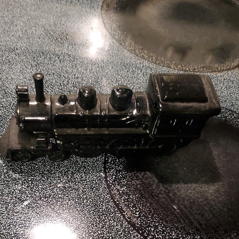 Avon Black Train Figurine